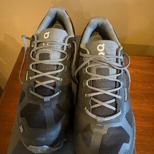 On Running Black and Gray Athletic Shoes